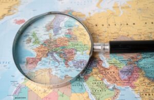 Map of Europe and Central Asia with Magnifying Glass