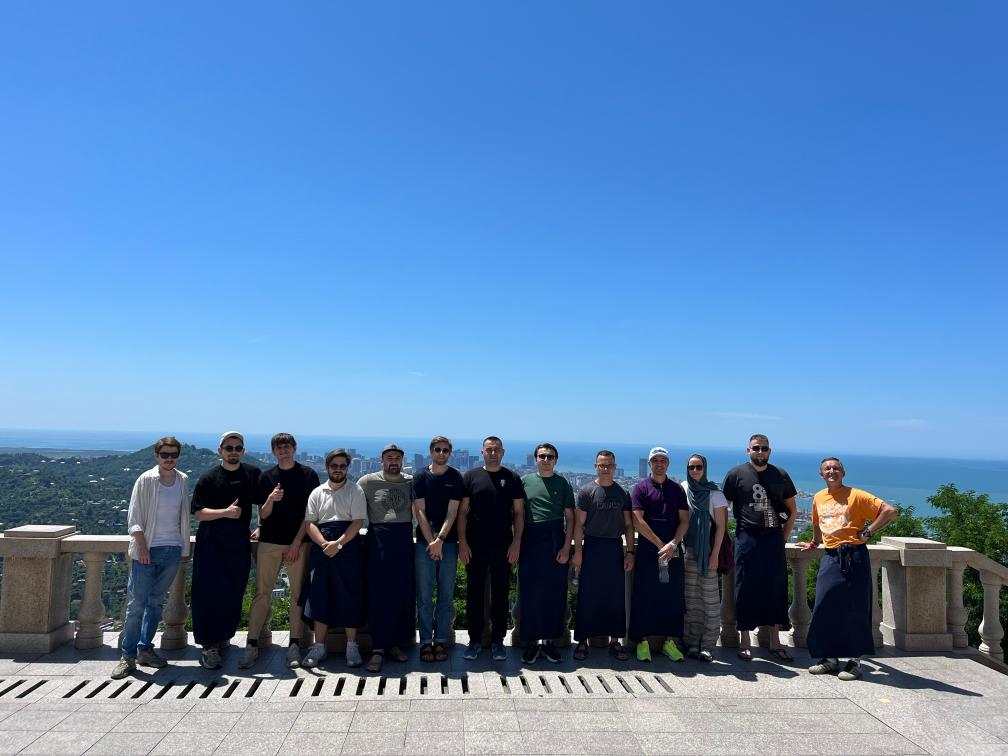 Team at monastery in Georgia