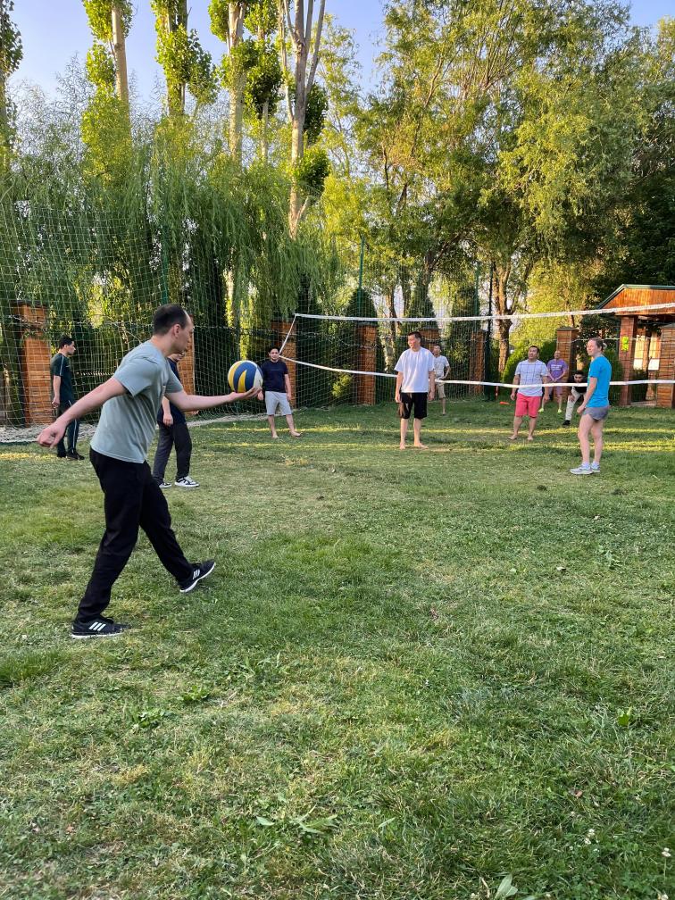 Team playing volleyball