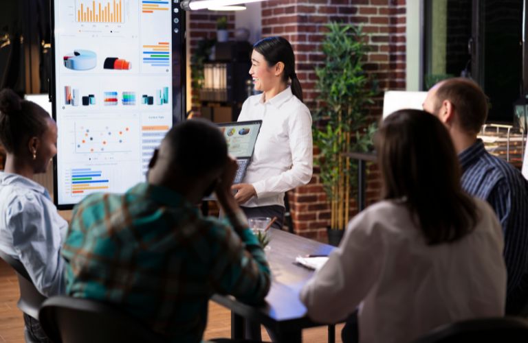 Product Manager Giving a Presentation to Team