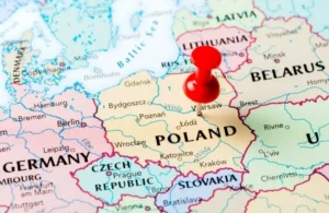 Map of Central Europe with a red pushpin marking the location of Poland.