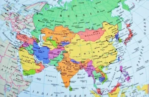 Detailed political map of Asia showing countries, borders, major cities, and surrounding oceans.