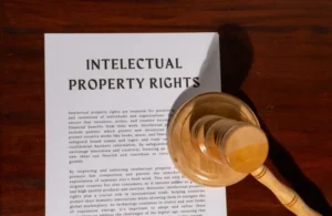 Document titled "Intellectual Property Rights" with a wooden judge's gavel on a wooden surface.
